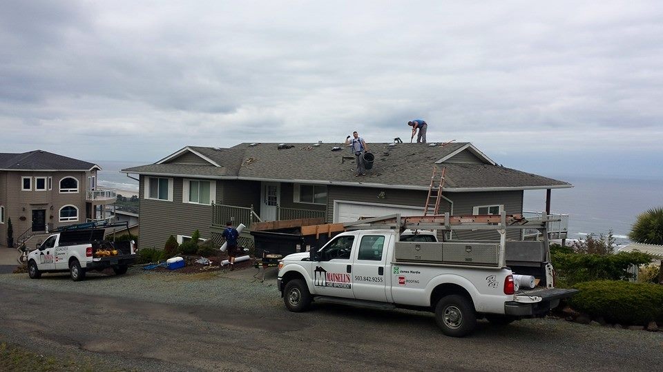 Matsell's Home Improvement crew working on a roofing project.